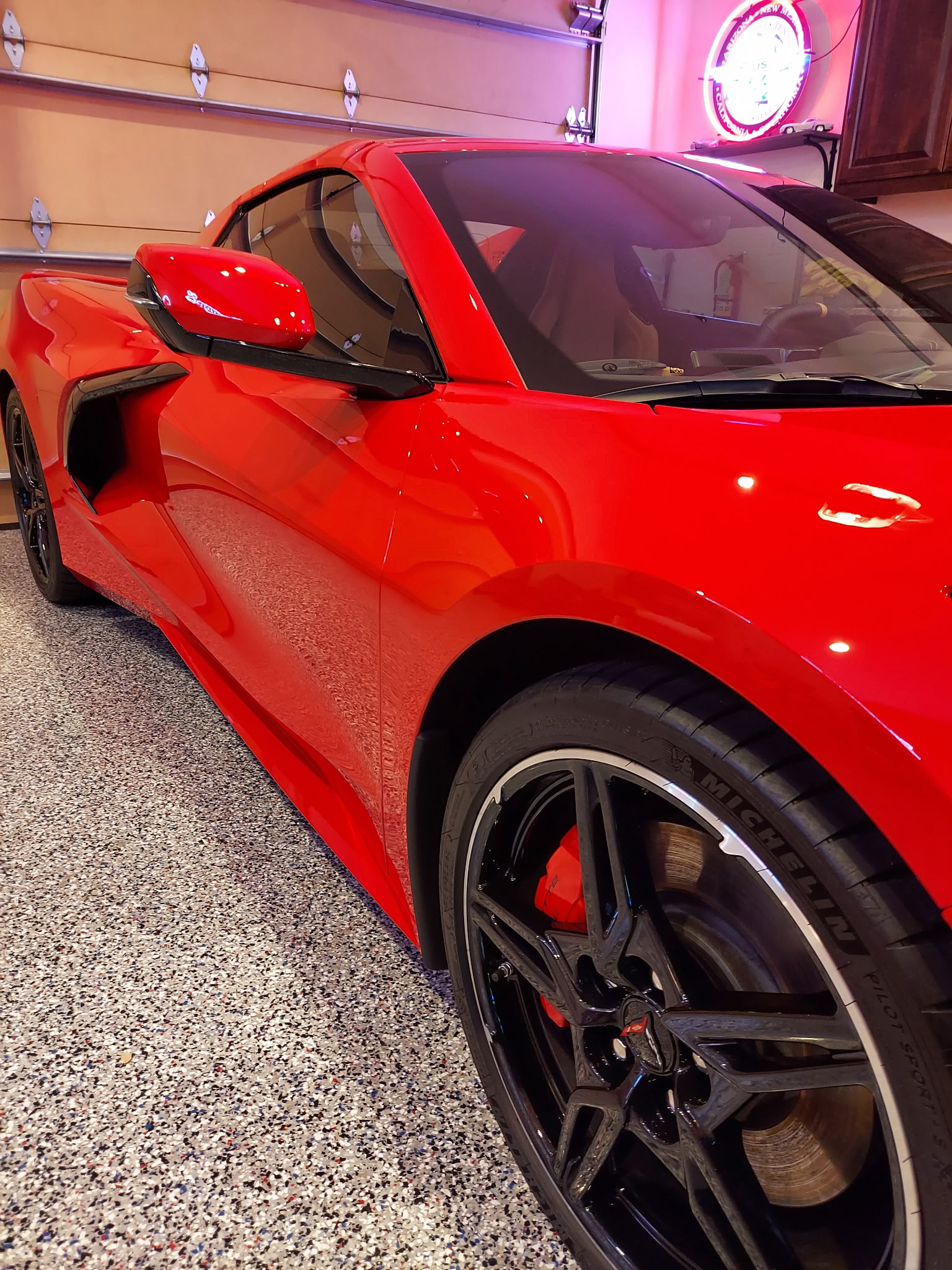 Red Chevrolet Corvette C8 after professional exterior detailing